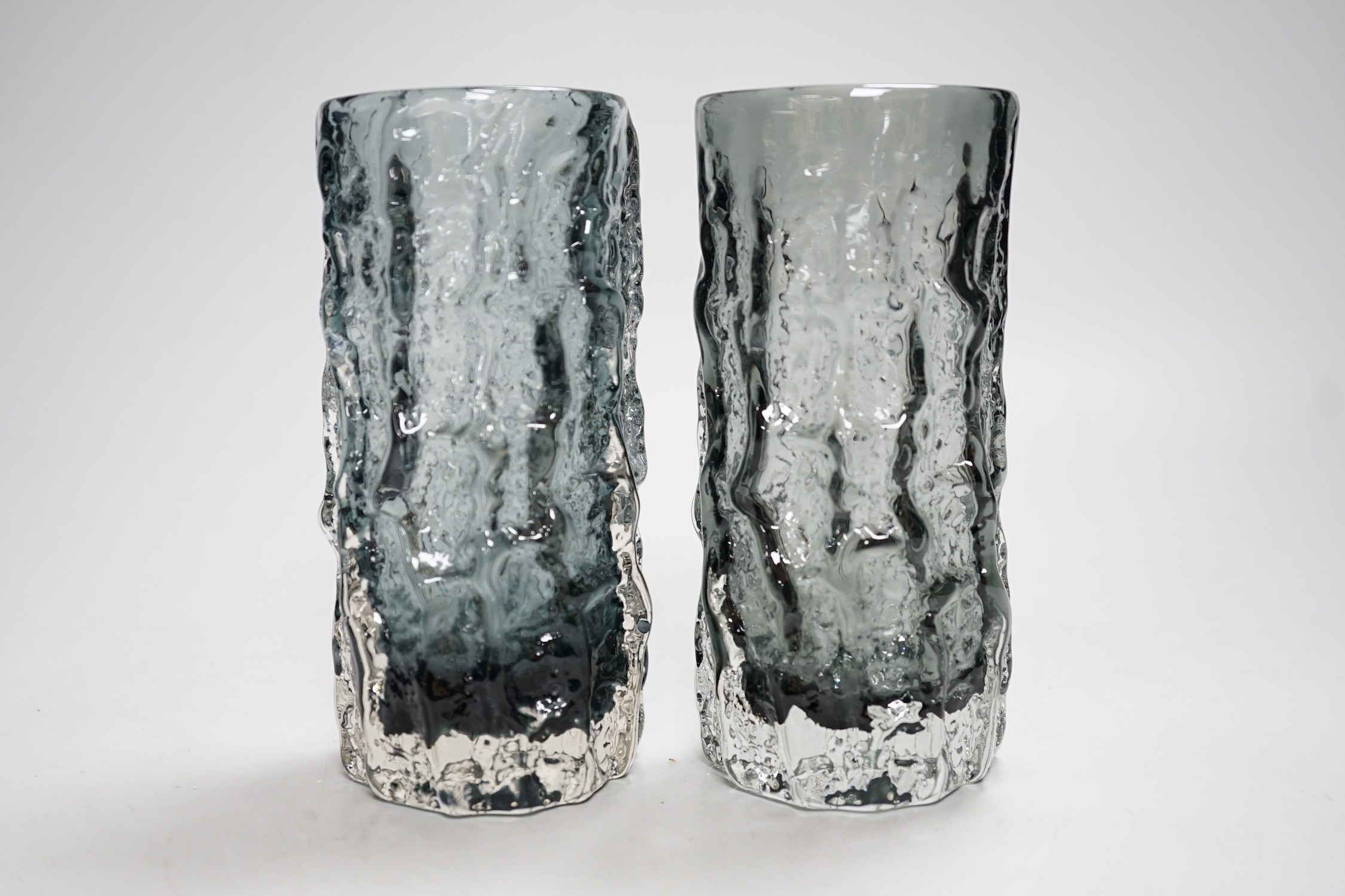 A pair of Whitefriars pewter glass bark vases. 15cm tall